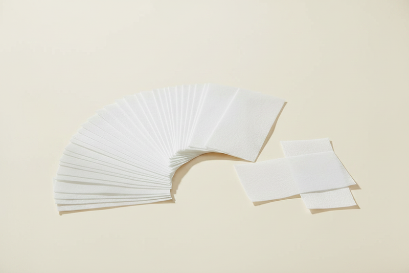 Laundry Detergent Sheets - white sheets flat lay
